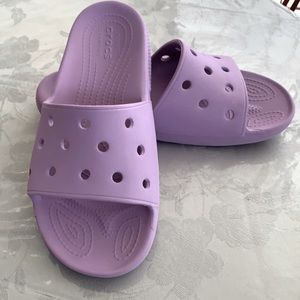 Crocs slides in lavender. Very good condition.Size 8 women, 6men.